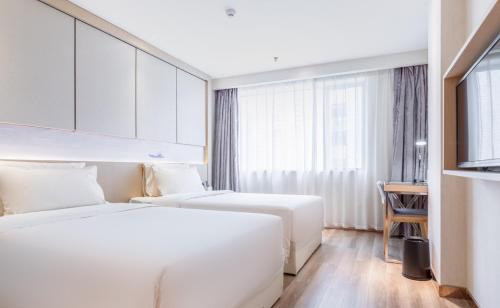 Imagen de la habitación del Hotel Atour Xiamen Xiagu Cruise Center. Foto 17