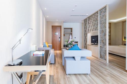 Imagen de la habitación del Hotel Atour Xiamen Xiagu Cruise Center. Foto 19