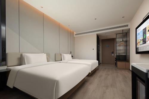 Imagen de la habitación del Hotel Atour Xiamen Xiang\'an Torch Industrial Park. Foto 8