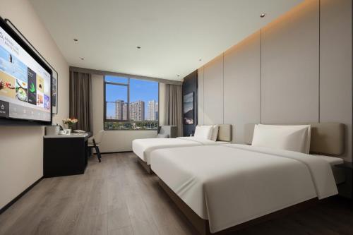 Imagen de la habitación del Hotel Atour Xiamen Xiang\'an Torch Industrial Park. Foto 9