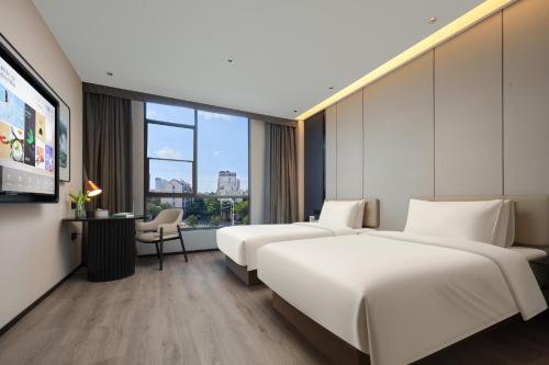 Imagen de la habitación del Hotel Atour Xiamen Xiang\'an Torch Industrial Park. Foto 11