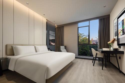 Imagen de la habitación del Hotel Atour Xiamen Xiang\'an Torch Industrial Park. Foto 16