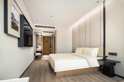 Imagen de la habitación del Hotel Atour Xiamen Zhongshan Road General Temple. Foto 8