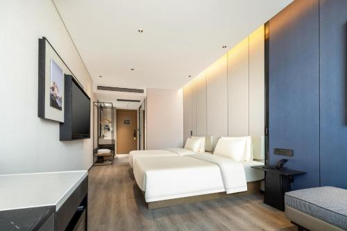 Imagen de la habitación del Hotel Atour Xiamen Zhongshan Road General Temple. Foto 10