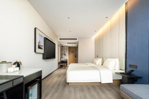 Imagen de la habitación del Hotel Atour Xiamen Zhongshan Road General Temple. Foto 11