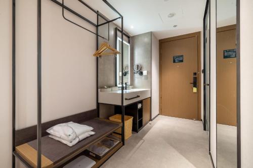 Imagen de la habitación del Hotel Atour Xiamen Zhongshan Road General Temple. Foto 13