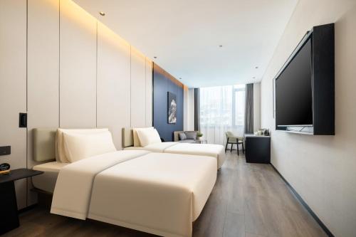Imagen de la habitación del Hotel Atour Xiamen Zhongshan Road General Temple. Foto 19