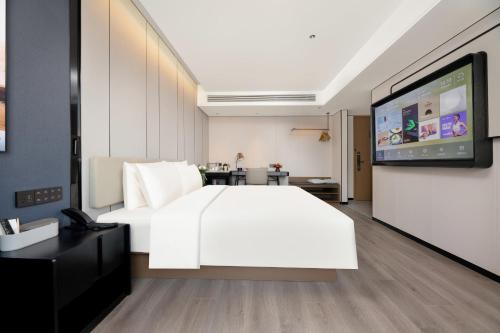 Imagen de la habitación del Hotel Atour Xi\'an Bell Tower Dacha City Metro Station. Foto 8