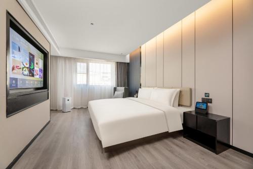 Imagen de la habitación del Hotel Atour Xi\'an Bell Tower Dacha City Metro Station. Foto 10