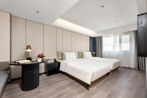 Imagen de la habitación del Hotel Atour Xi\'an Bell Tower Dacha City Metro Station. Foto 11