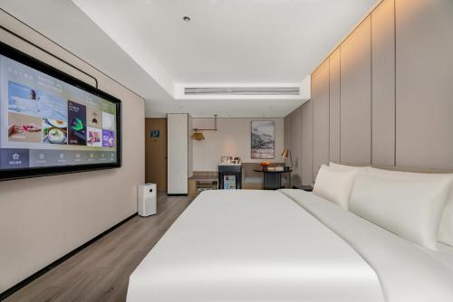 Imagen de la habitación del Hotel Atour Xi\'an Bell Tower Dacha City Metro Station. Foto 12