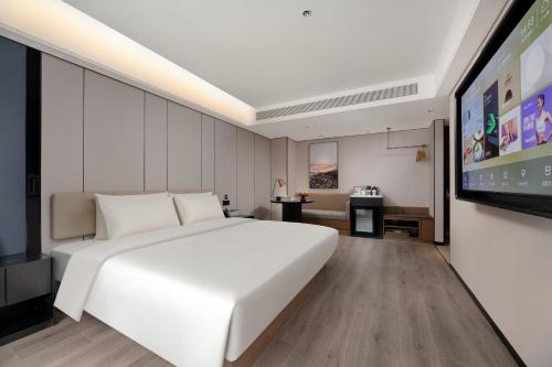 Imagen de la habitación del Hotel Atour Xi\'an Bell Tower Dacha City Metro Station. Foto 13
