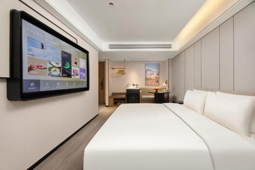 Imagen de la habitación del Hotel Atour Xi\'an Bell Tower Dacha City Metro Station. Foto 14