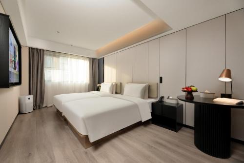 Imagen de la habitación del Hotel Atour Xi\'an Bell Tower Dacha City Metro Station. Foto 15