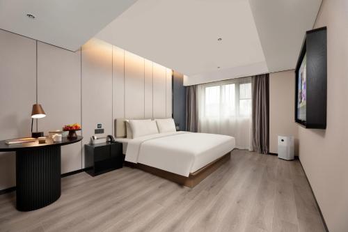 Imagen de la habitación del Hotel Atour Xi\'an Bell Tower Dacha City Metro Station. Foto 16