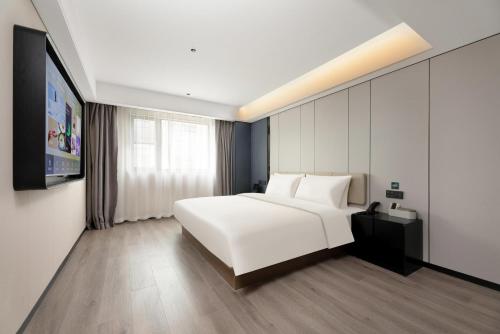 Imagen de la habitación del Hotel Atour Xi\'an Bell Tower Dacha City Metro Station. Foto 18