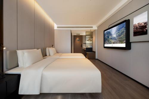 Imagen de la habitación del Hotel Atour Xichang Municipal Affairs Center. Foto 4