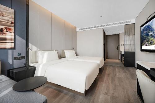 Imagen de la habitación del Hotel Atour Xichang Qionghai Wetland Park Aerospace Avenue. Foto 17