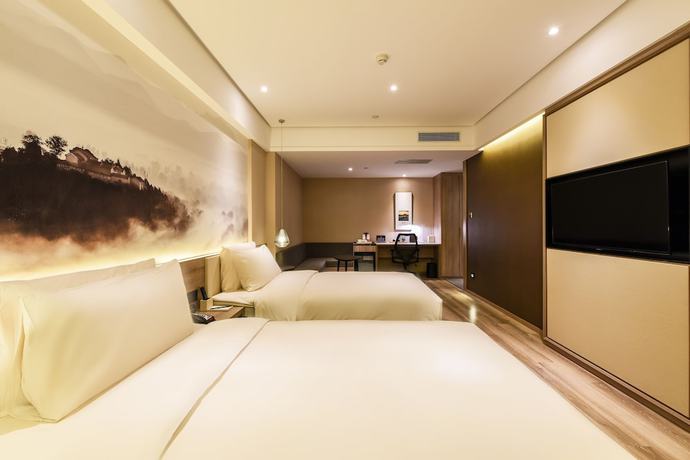 Imagen de la habitación del Hotel Atour Xichang Road Langfang. Foto 2