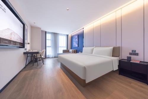 Imagen de la habitación del Hotel Atour Yangchun Lake Wuhan High Speed Rail Station. Foto 3