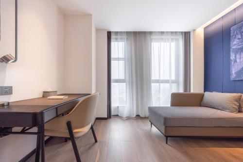 Imagen de la habitación del Hotel Atour Yangchun Lake Wuhan High Speed Rail Station. Foto 4