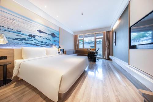Imagen de la habitación del Hotel Atour Yantai South Station Yingchun Street. Foto 9