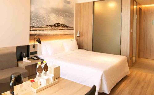 Imagen de la habitación del Hotel Atour Yantai South Station Yingchun Street. Foto 12