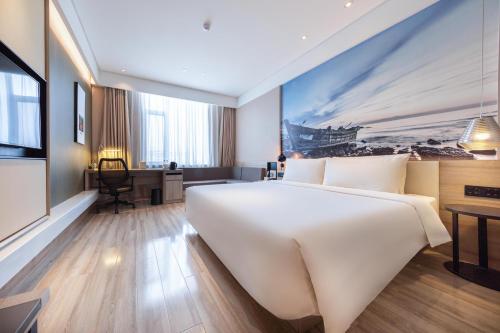 Imagen de la habitación del Hotel Atour Yantai South Station Yingchun Street. Foto 14