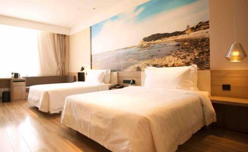 Imagen de la habitación del Hotel Atour Yantai South Station Yingchun Street. Foto 16