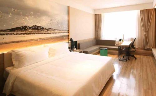 Imagen de la habitación del Hotel Atour Yantai South Station Yingchun Street. Foto 17