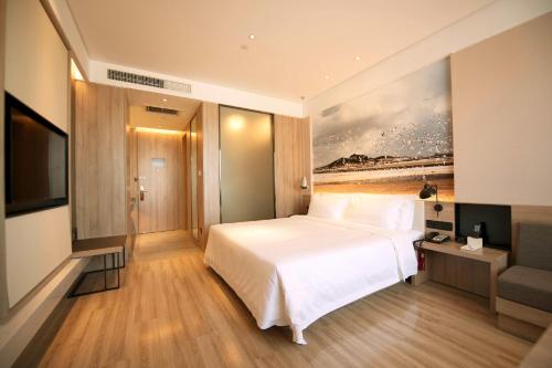 Imagen de la habitación del Hotel Atour Yantai South Station Yingchun Street. Foto 18