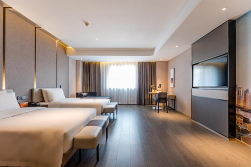 Imagen de la habitación del Hotel Atour Yixian Building Wujiaochang Shanghai. Foto 15