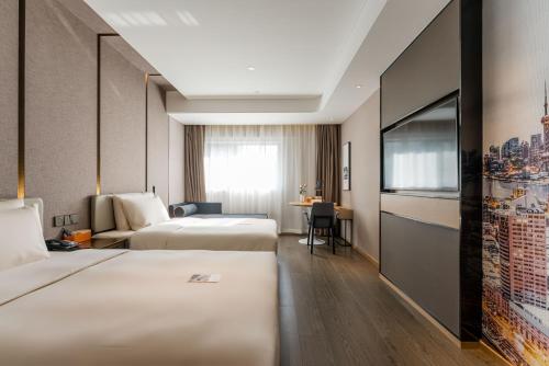 Imagen de la habitación del Hotel Atour Yixian Building Wujiaochang Shanghai. Foto 16