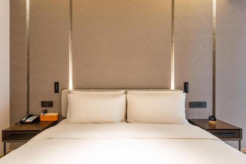 Imagen de la habitación del Hotel Atour Yixian Building Wujiaochang Shanghai. Foto 17