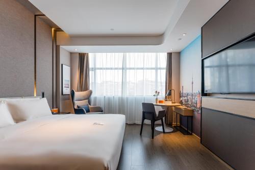 Imagen de la habitación del Hotel Atour Yixian Building Wujiaochang Shanghai. Foto 19