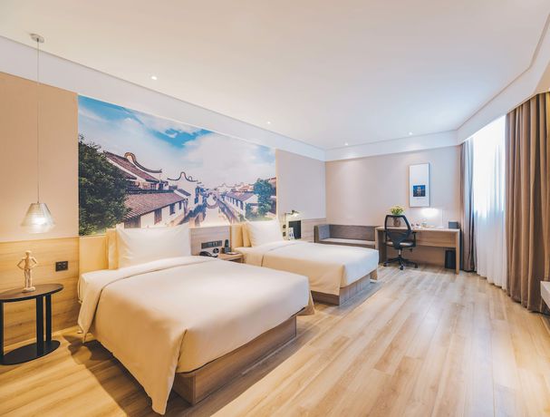 Imagen de la habitación del Hotel Atour Yixing Eco Tech Park Wuxi. Foto 11