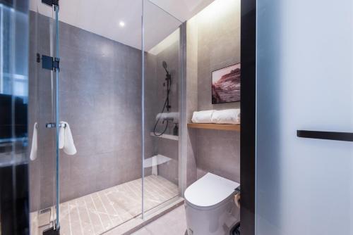 Imagen de la habitación del Hotel Atour Yuxi Nie\'er Music Plaza. Foto 13