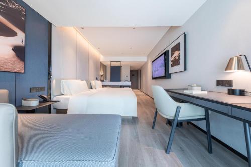 Imagen de la habitación del Hotel Atour Zhaoqing Qixingyan. Foto 12