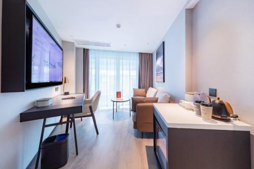 Imagen de la habitación del Hotel Atour Zhaoqing Qixingyan. Foto 13