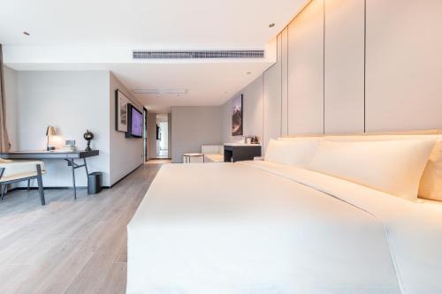 Imagen de la habitación del Hotel Atour Zhaoqing Qixingyan. Foto 16