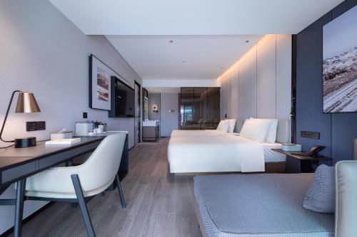 Imagen de la habitación del Hotel Atour Zhaoqing Qixingyan. Foto 17