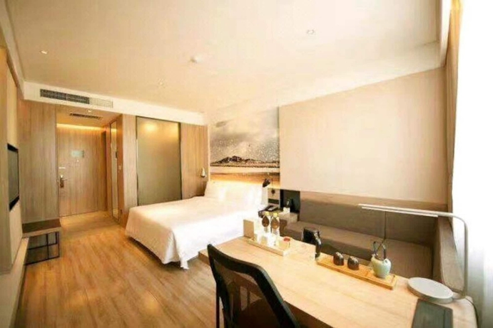 Imagen de la habitación del Hotel Atour Zhenda Road South Station Yantai. Foto 10