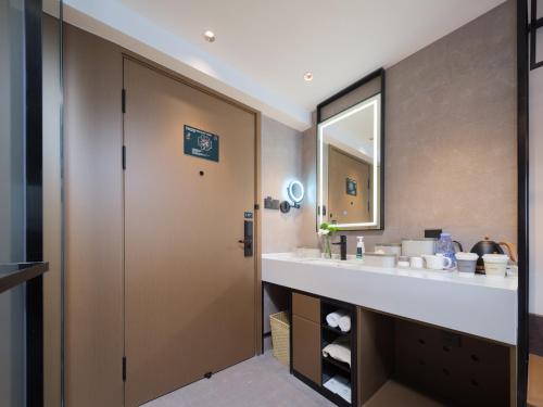 Imagen de la habitación del Hotel Atour Zhengzhou Erqi Plaza David City. Foto 15