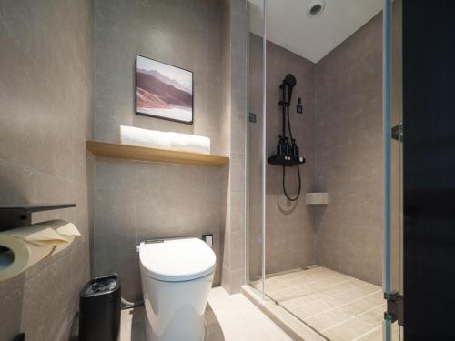 Imagen de la habitación del Hotel Atour Zhengzhou Erqi Plaza David City. Foto 16