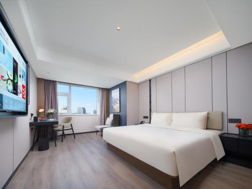 Imagen de la habitación del Hotel Atour Zhengzhou Erqi Plaza David City. Foto 17