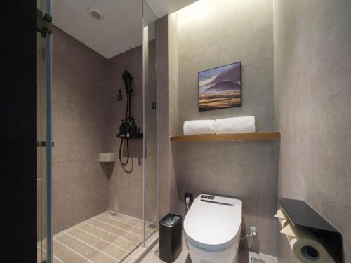 Imagen de la habitación del Hotel Atour Zhengzhou Erqi Plaza David City. Foto 20