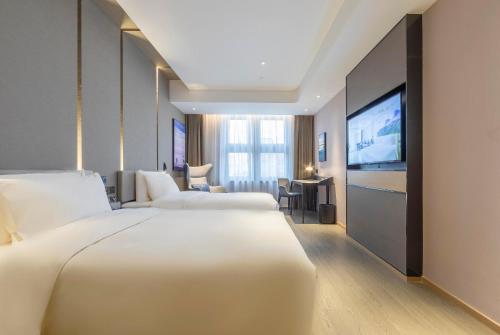 Imagen de la habitación del Hotel Atour Zhengzhou High-Tech Star Union. Foto 9