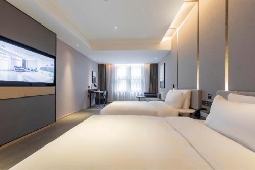 Imagen de la habitación del Hotel Atour Zhengzhou High-Tech Star Union. Foto 10