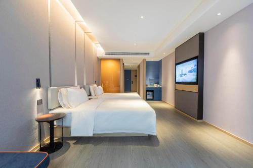 Imagen de la habitación del Hotel Atour Zhengzhou High-Tech Star Union. Foto 11