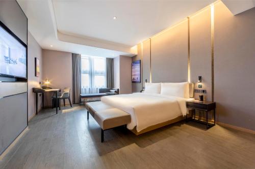 Imagen de la habitación del Hotel Atour Zhengzhou High-Tech Star Union. Foto 12